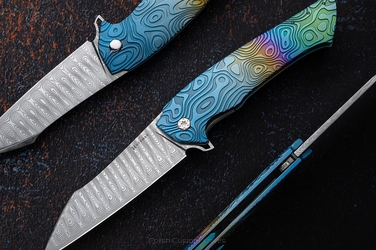 FOLDING KNIFE FOLDER OVIUM GENERATION 2 #0132 DAMASTEEL NEBULA RIPPLE HALF DRESS HERMAN KNIVES