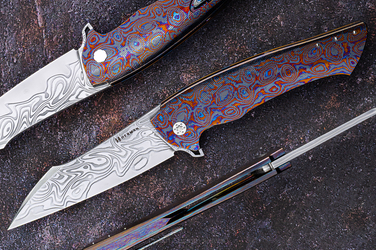 FOLDING KNIFE FOLDER OVIUM GENERATION 2 #0125 DAMACORE BLACK TIMASCUS FULL DRESS HERMAN KNIVES